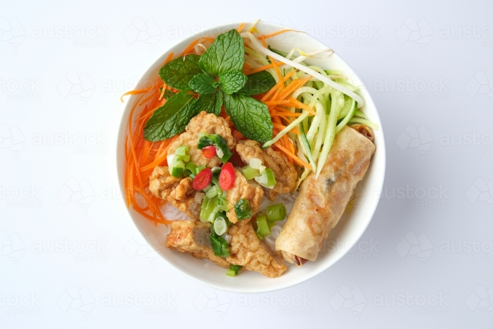 Bun Cha Gio bowl topped with fried spring roll and Cha Lua. - Australian Stock Image