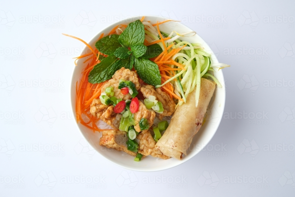 Bun Cha Gio bowl topped with fried spring roll and Cha Lua. - Australian Stock Image