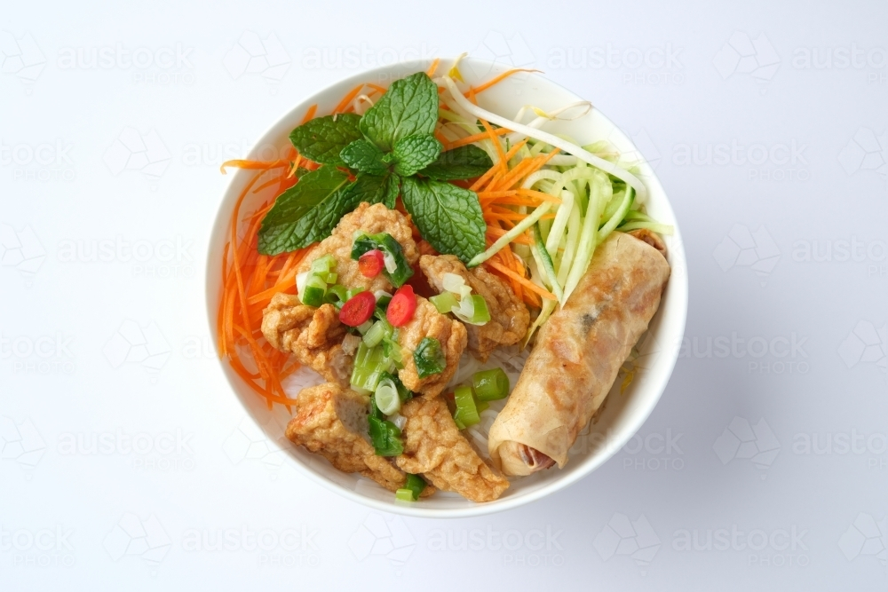Bun Cha Gio bowl topped with fried spring roll and Cha Lua. - Australian Stock Image