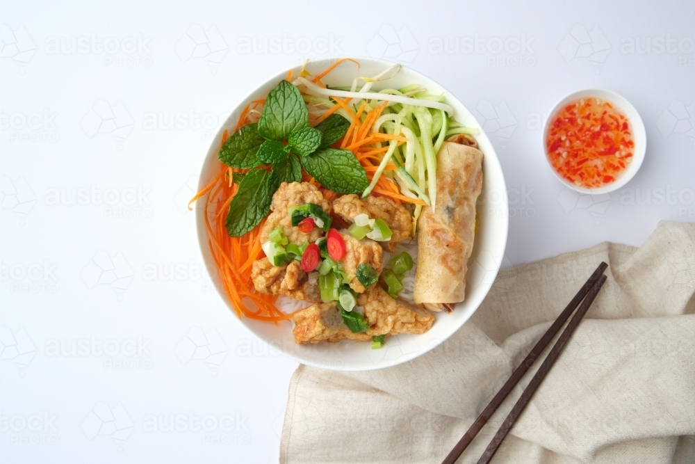 Bun Cha Gio bowl topped with fried spring roll and Cha Lua. - Australian Stock Image