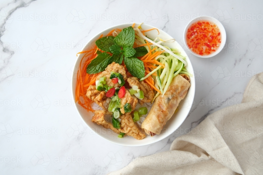 Bun Cha Gio bowl topped with fried spring roll and Cha Lua. - Australian Stock Image