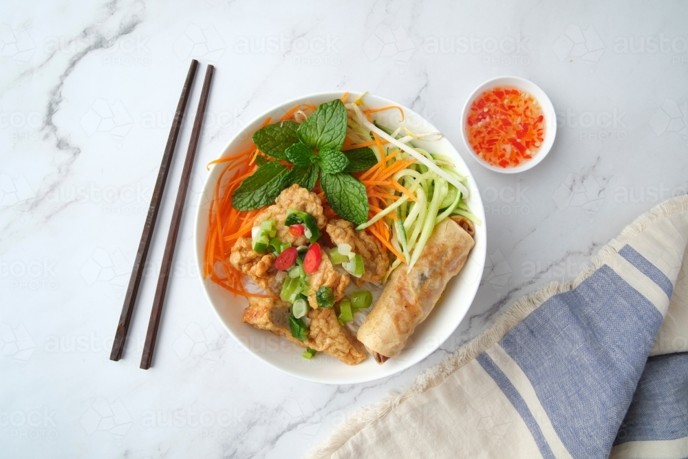 Bun Cha Gio bowl topped with fried spring roll and Cha Lua. - Australian Stock Image
