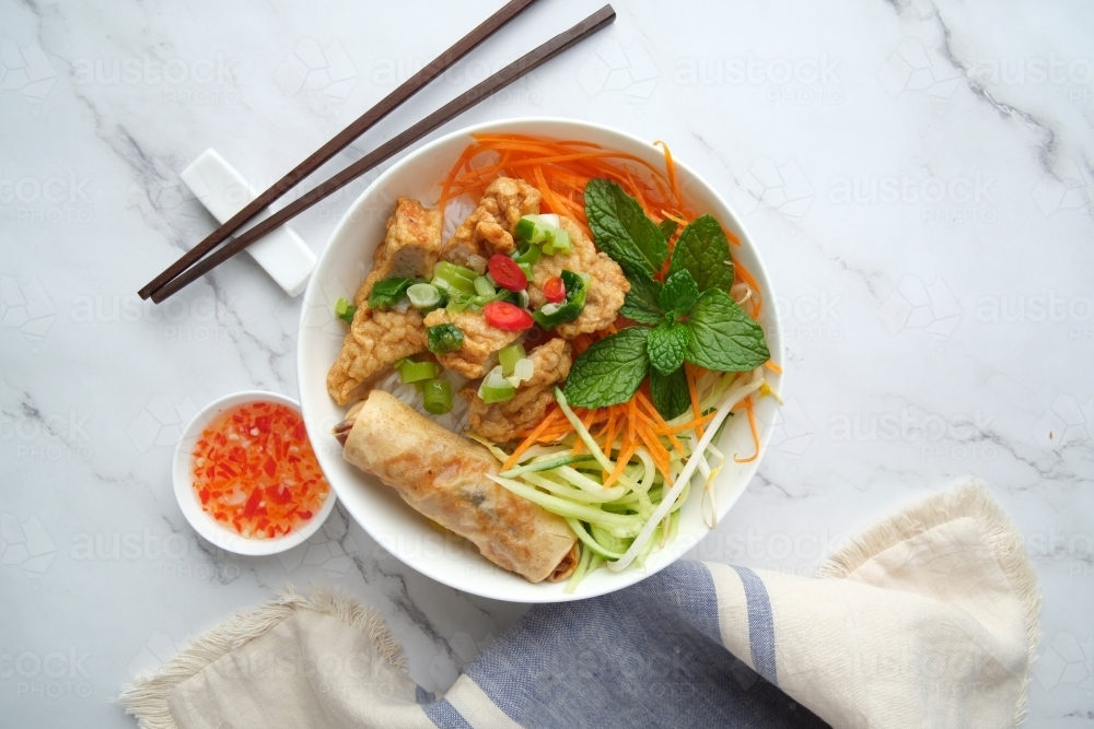 Bun Cha Gio bowl topped with fried spring roll and Cha Lua. - Australian Stock Image