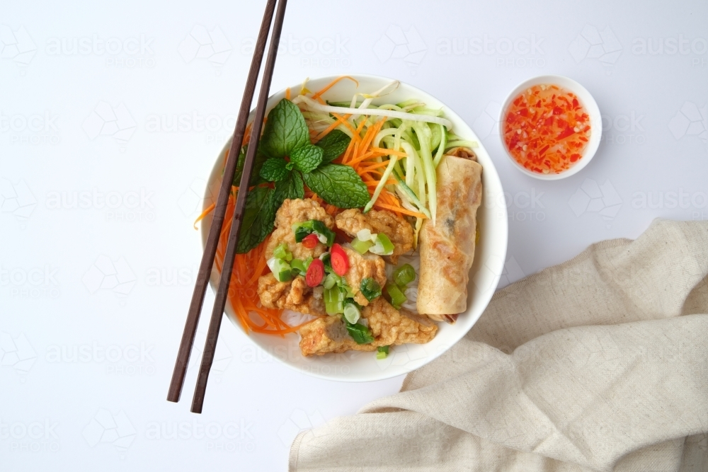 Bun Cha Gio bowl topped with fried spring roll and Cha Lua - Australian Stock Image