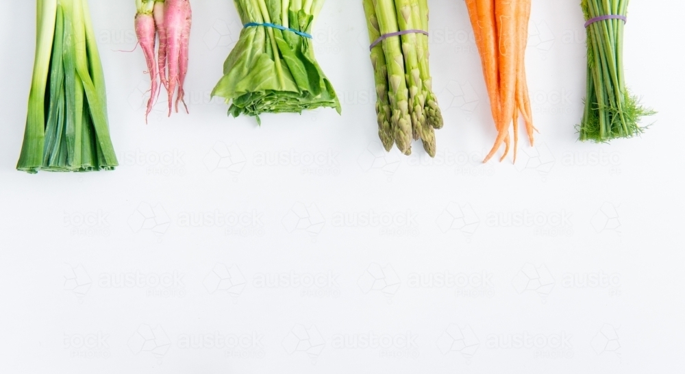 Bunches of Vegetables on white - Australian Stock Image