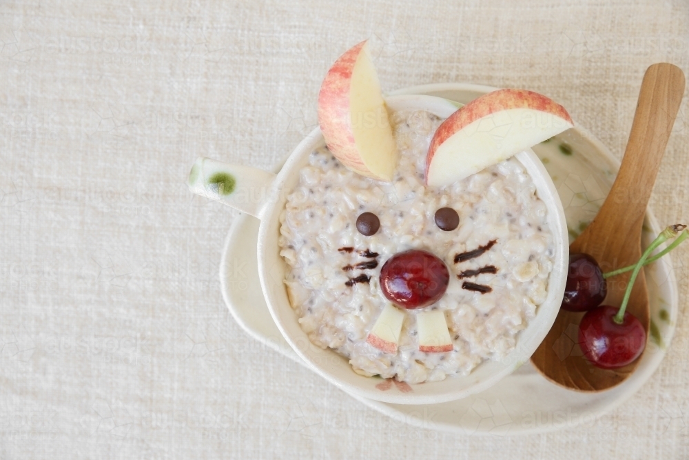 Bunny rabbit oatmeal porridge Easter breakfast, fun food art for kids - Australian Stock Image