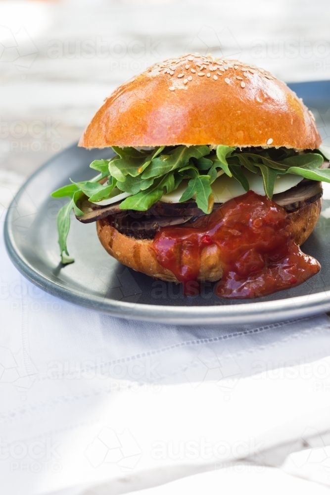 burger with tomato relish - Australian Stock Image