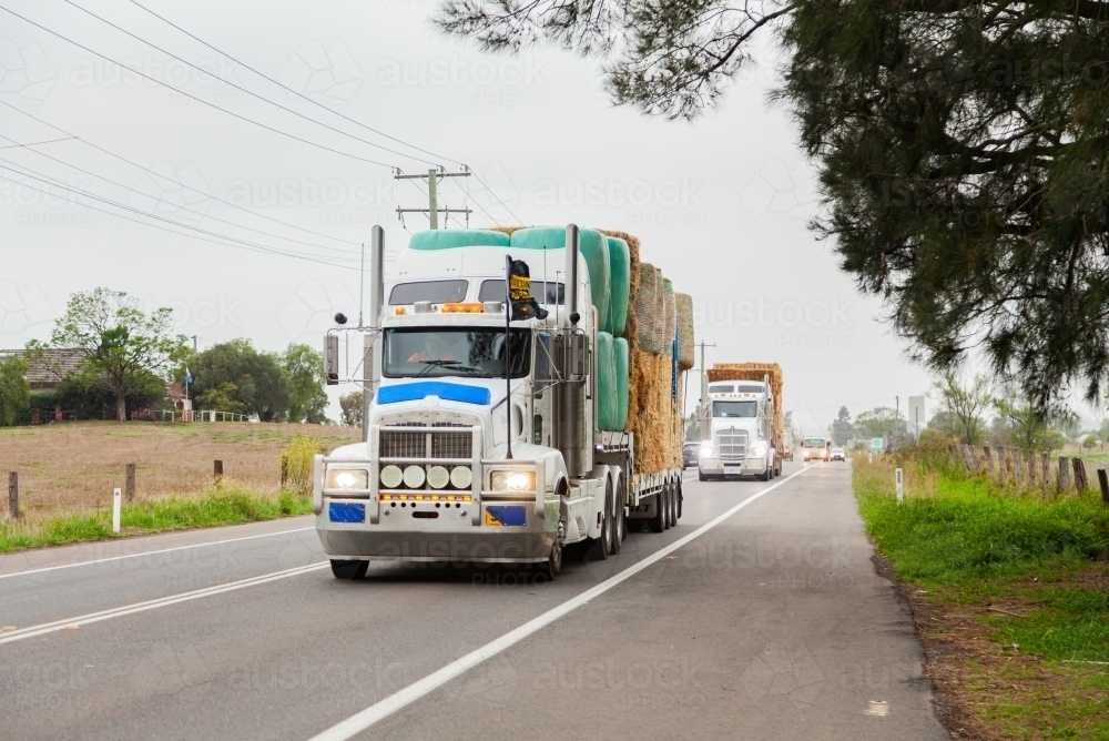 Burrumbuttock Hay Runners going through Singleton on their way to assist farmers - Australian Stock Image
