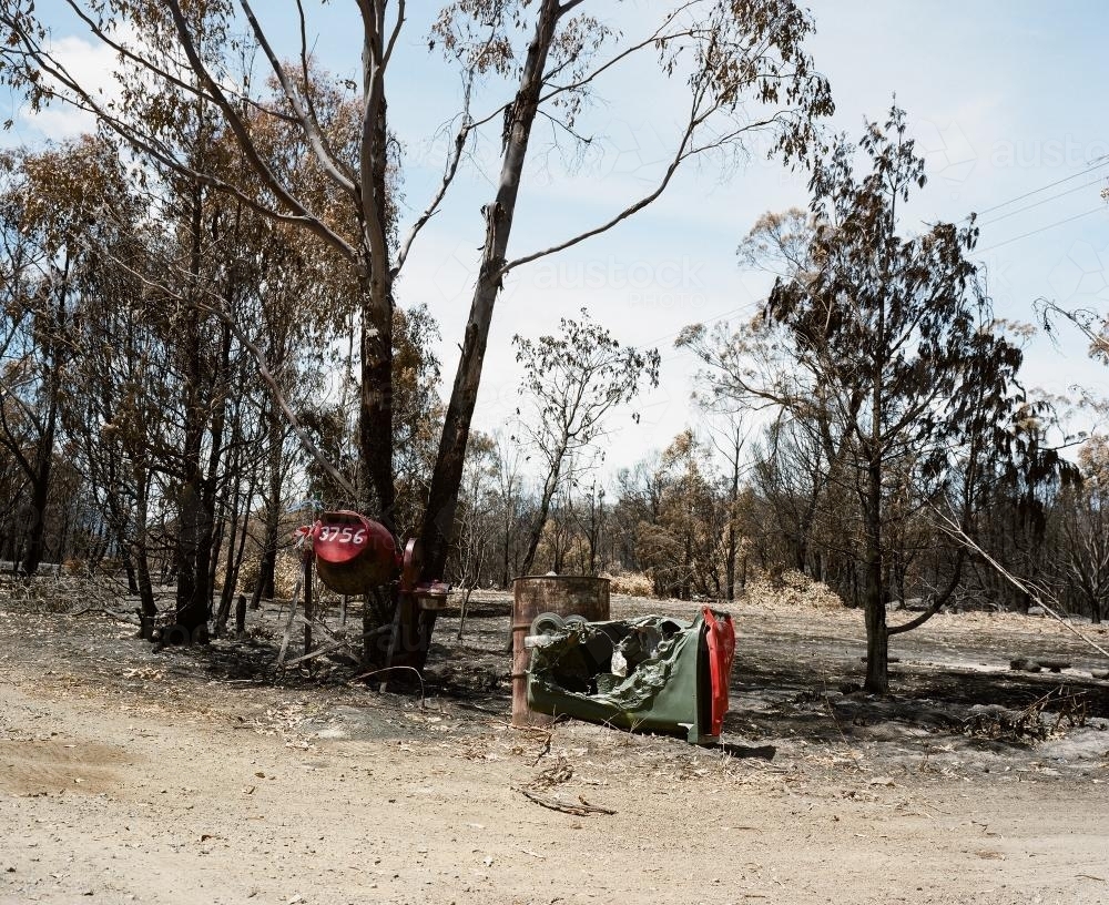 Bushfire ravaged landscape at farm entrance - Australian Stock Image
