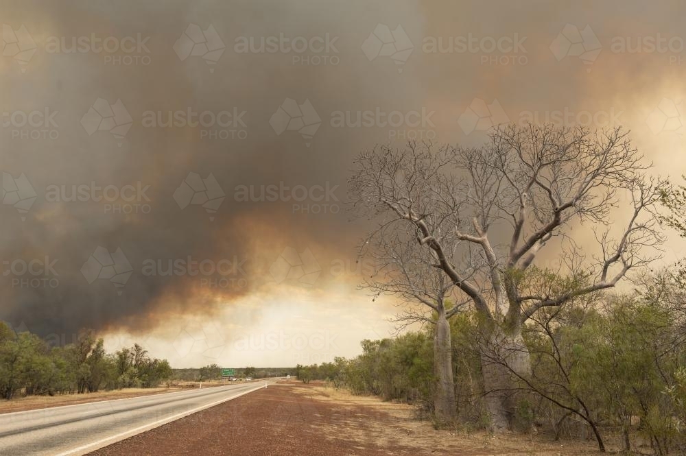 bushfire smoke across highway in north west australia - Australian Stock Image