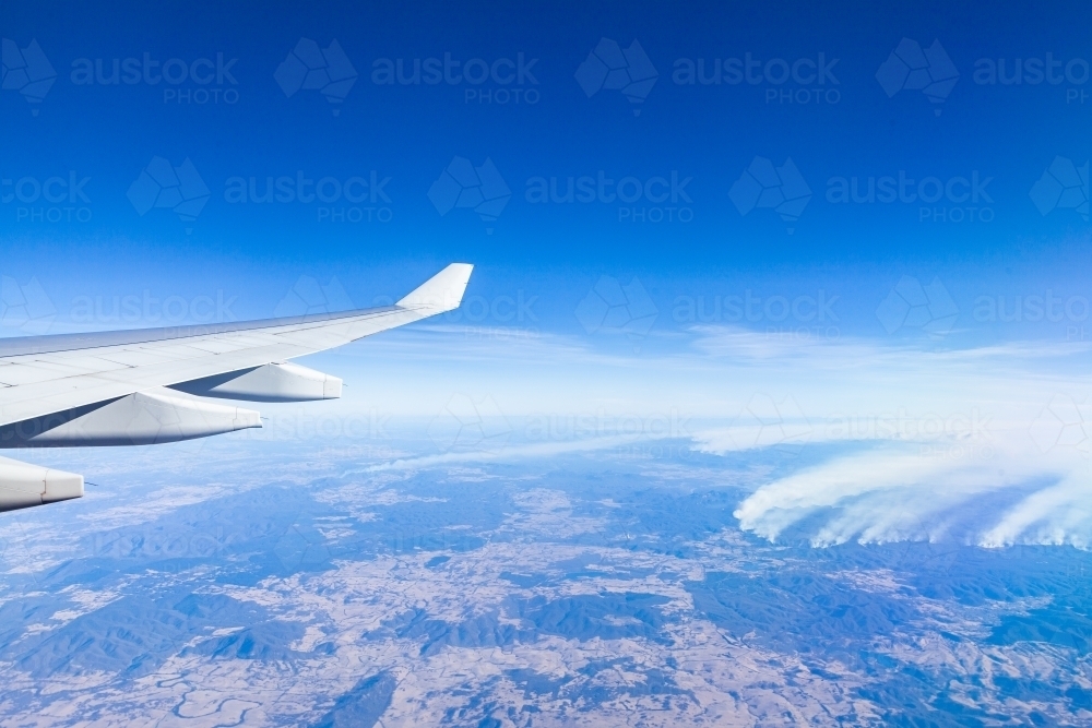 Bushfire smoke in NSW seen from plane window - Australian Stock Image