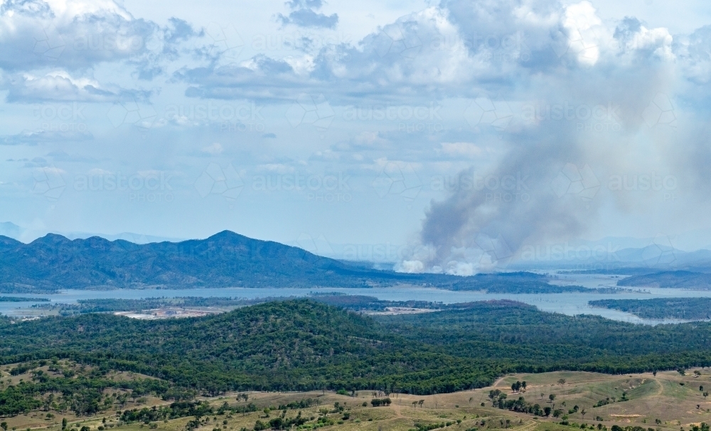 Bushfires on the southern side of Lake Awoonga - Australian Stock Image