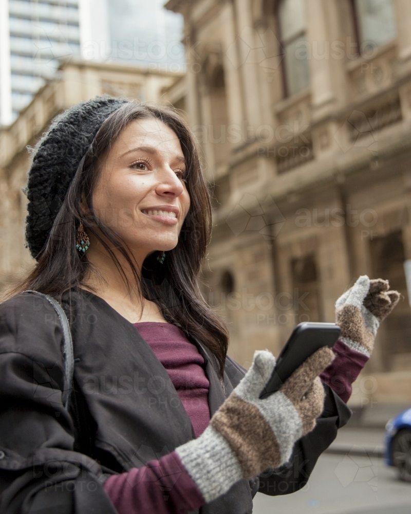 Business Woman Hailing a Taxi - Australian Stock Image