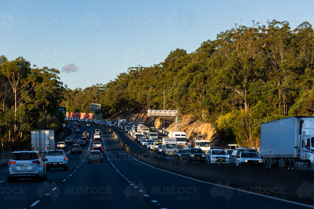 Busy multi lane highway road in approaching Sydney with traffic bumper to bumper - Australian Stock Image