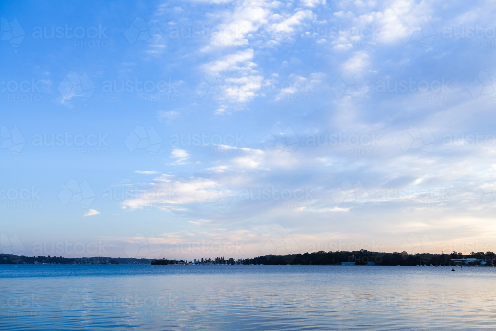 calm landscape view of cockle bay waters at dusk from speers point - Australian Stock Image