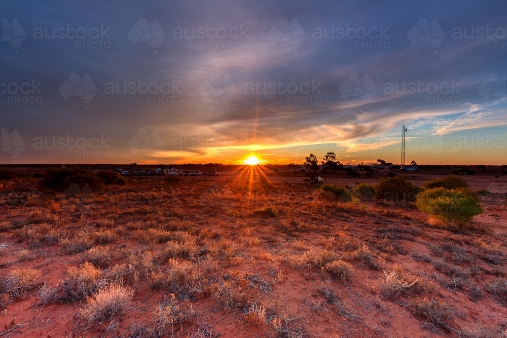 Cameron Corner sunset over caravan park - Australian Stock Image
