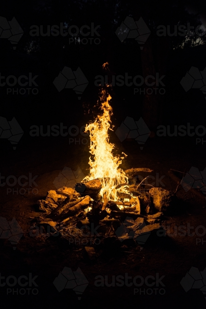 Camp fire at night - Australian Stock Image
