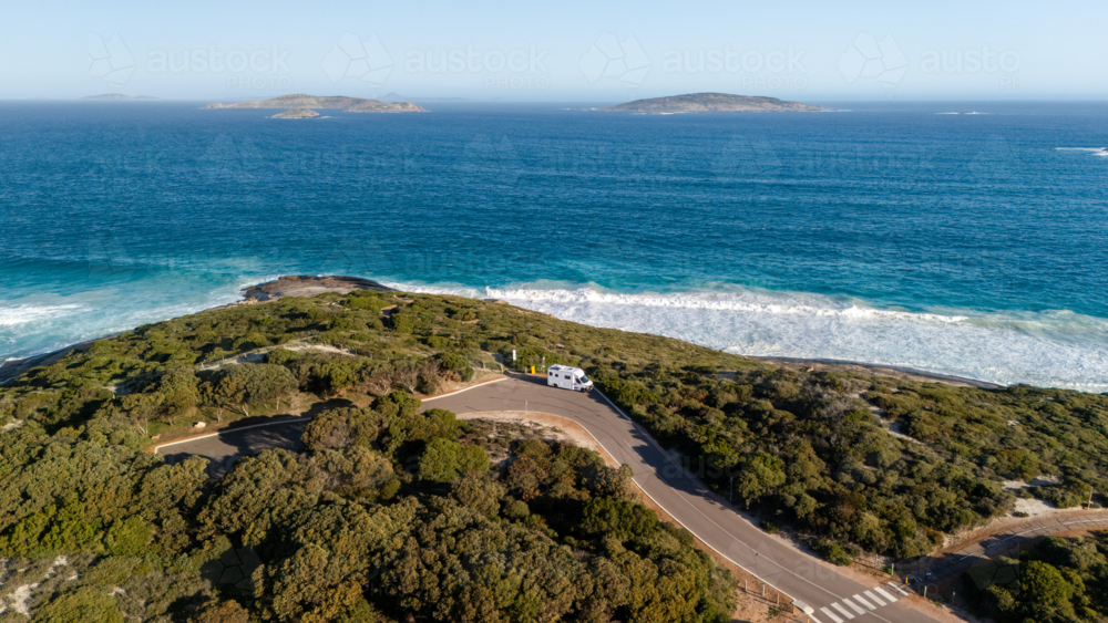 Camper van parked on the roadside along the coast - Australian Stock Image