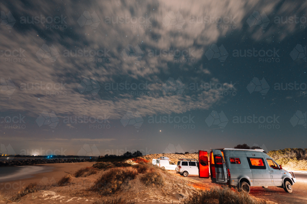 Image of Camper vans parked up under the starry night sky at Iluka New ...