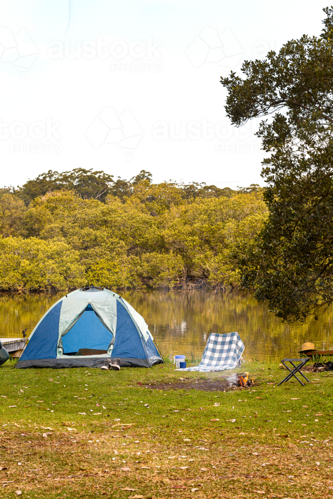 Camping tent built beside the lake - Australian Stock Image
