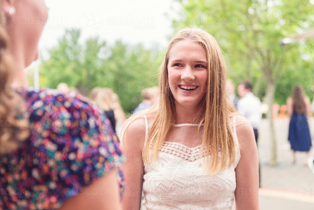 candid image of natural teen girl at her middle school formal - Australian Stock Image