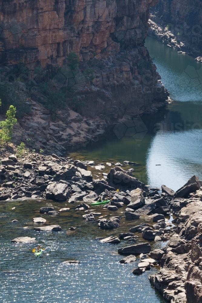 Canoeists in deep rocky gorge - Australian Stock Image