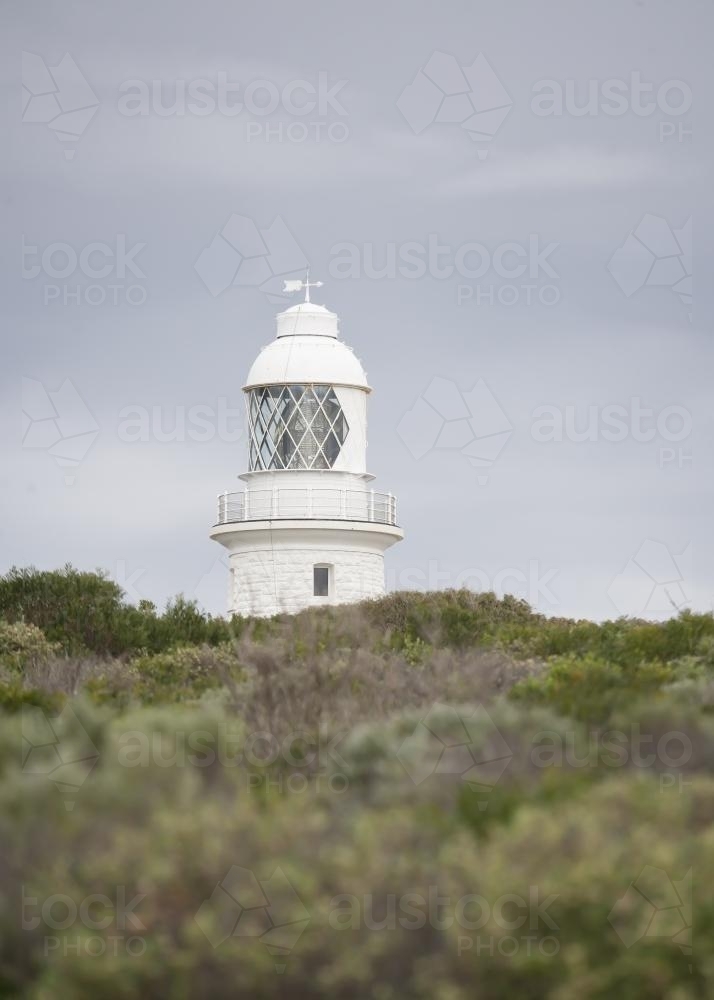 Cape Leeuwin lighthouse with scrub in foreground - Australian Stock Image