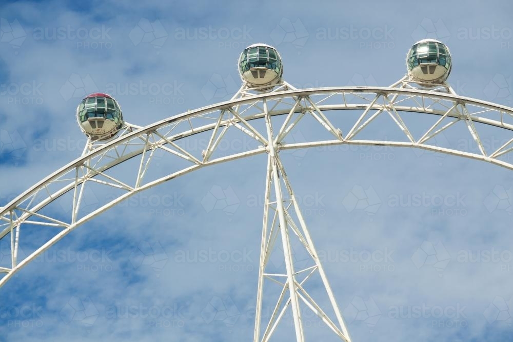 Capsules on a large ferris wheel, high in the sky - Australian Stock Image