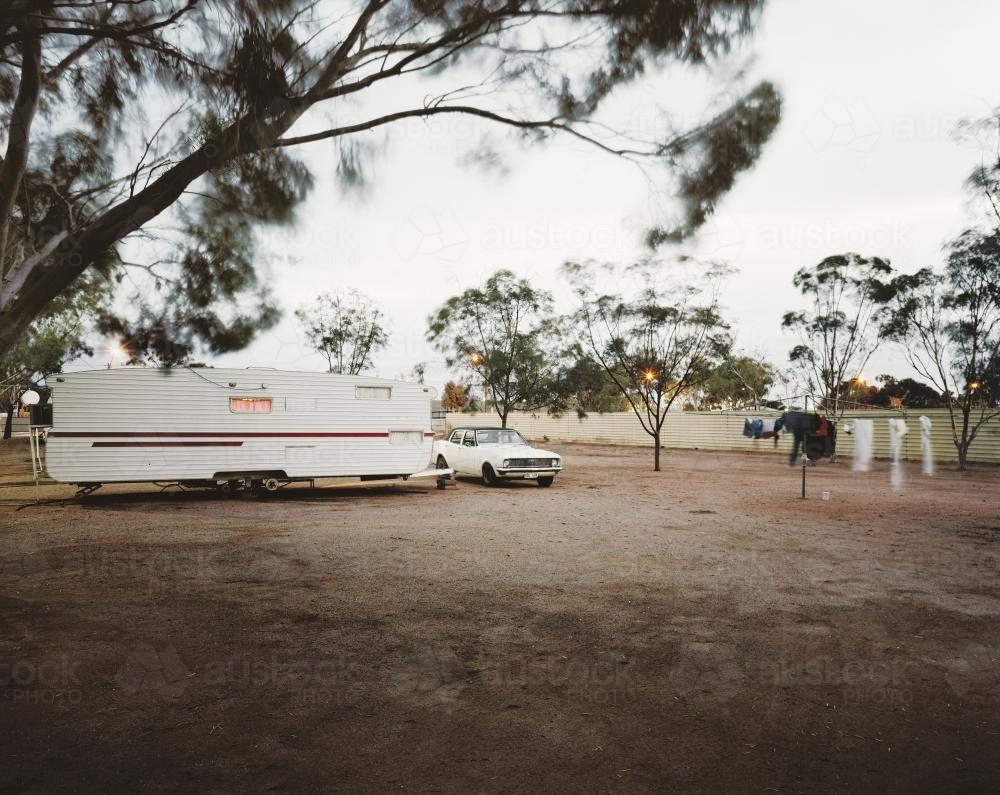 Car and caravan in outback camp ground - Australian Stock Image