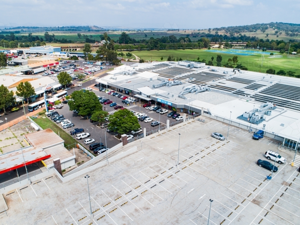 Car park beside shopping center in town - Australian Stock Image