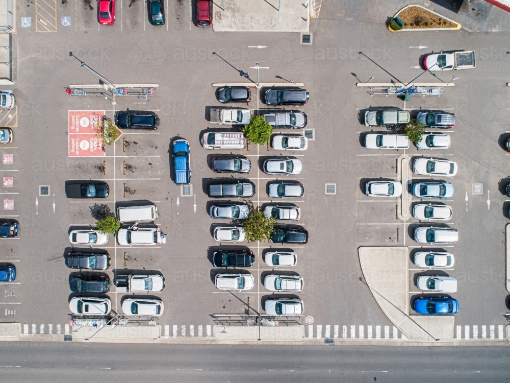 Car park beside shopping center in town - Australian Stock Image