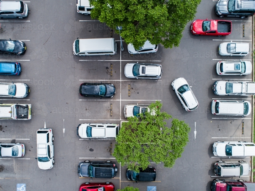 Car park beside shopping center in town - Australian Stock Image