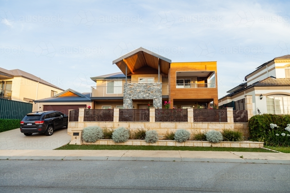 Image of Car parked in driveway of home in Iluka Perth Austockphoto
