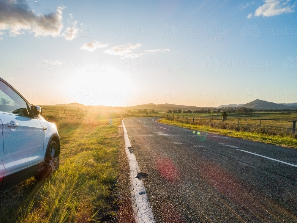 Car pulled over to side of road in country Australia to take in the view - Australian Stock Image