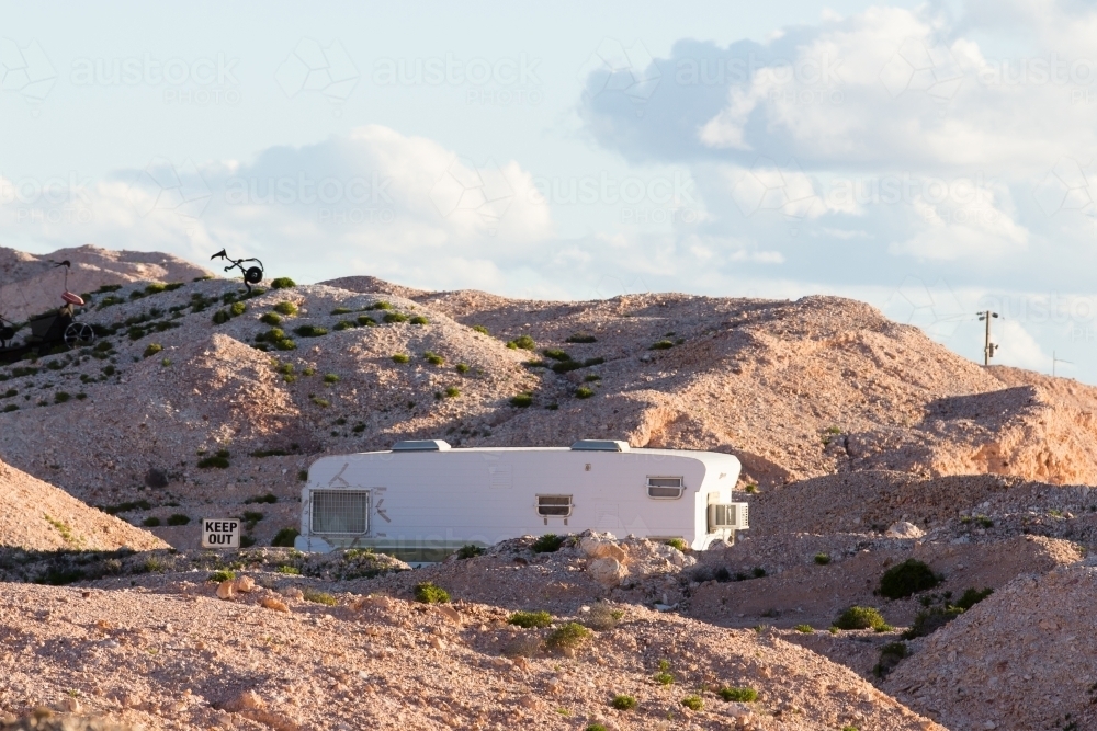 Caravan with 'keep out' sign at outback town - Australian Stock Image