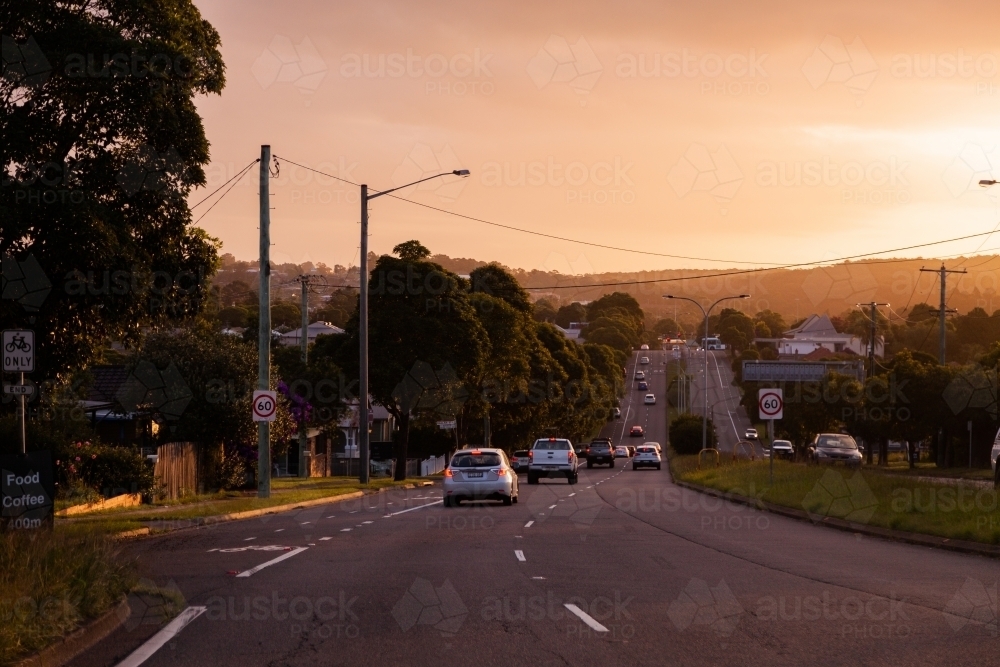 Cars driving in low light conditions with hazardous visibility - Australian Stock Image
