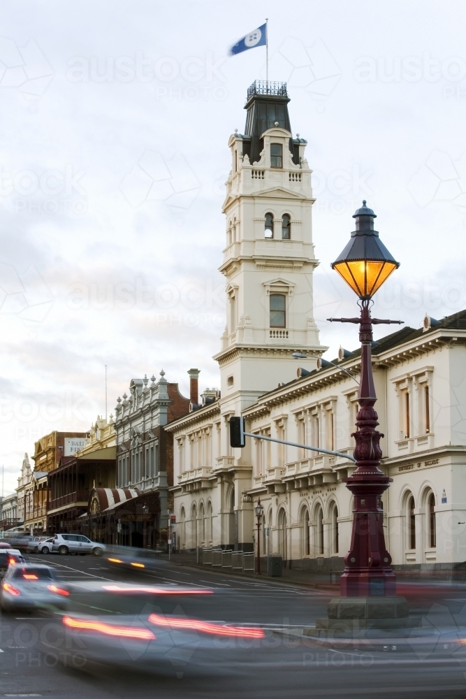 Cars passing buildings at intersection of Sturt and Lydiard Street, Ballarat - Australian Stock Image