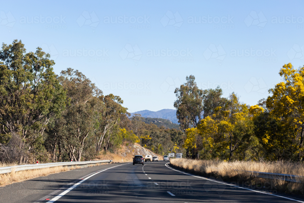 Image of cars traveling down highway road on road trip adventure ...