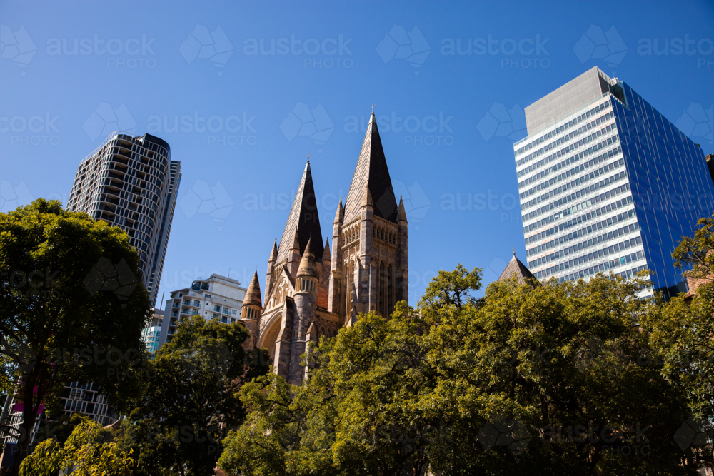 Cathedral spires and skyscrapers in Brisbane City - Australian Stock Image