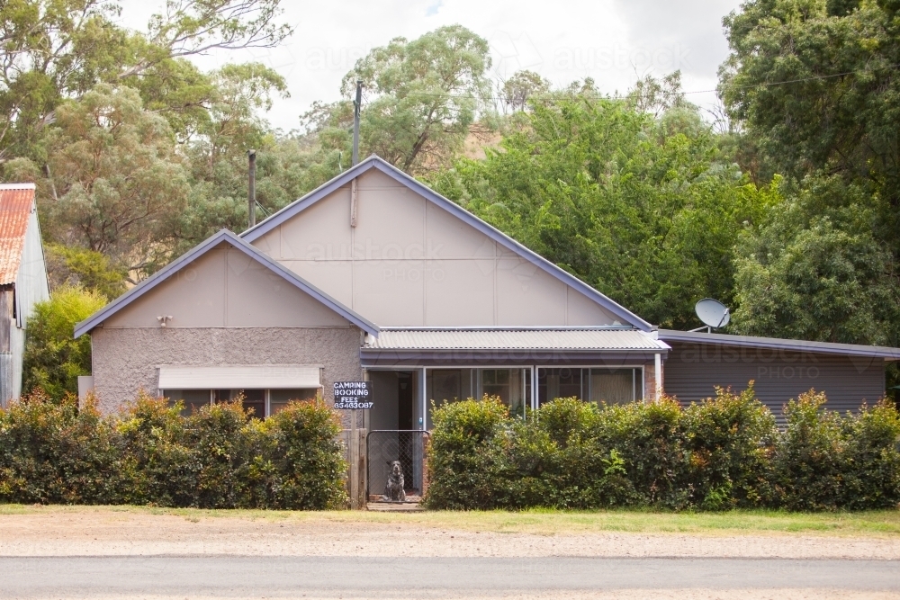 Cattle dog and his house - Australian Stock Image