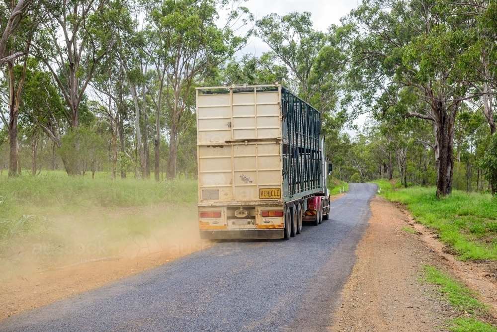 Cattle truck on country road - Australian Stock Image