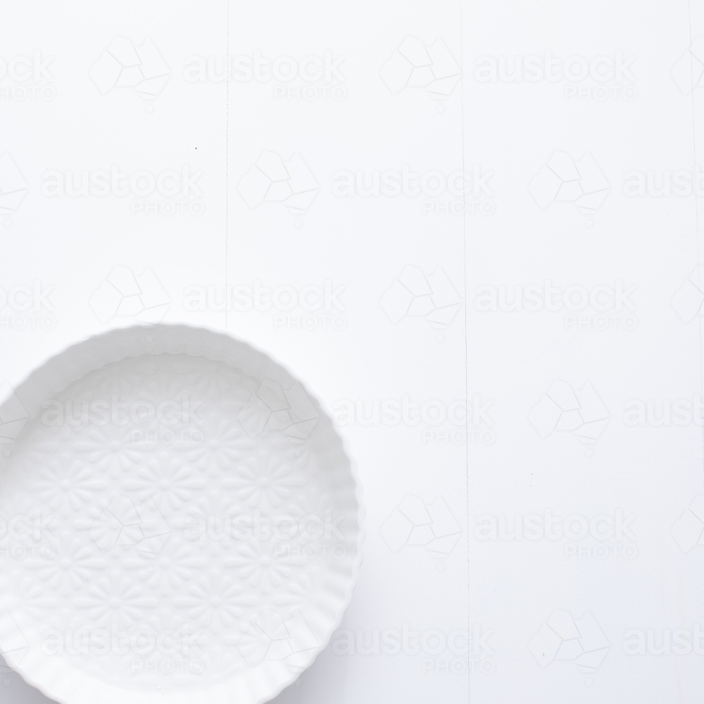 Ceramic pie dish on blank background - Australian Stock Image
