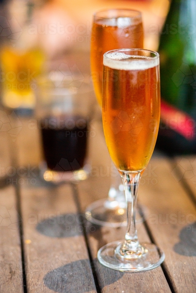 Champagne in flute on picnic table - Australian Stock Image