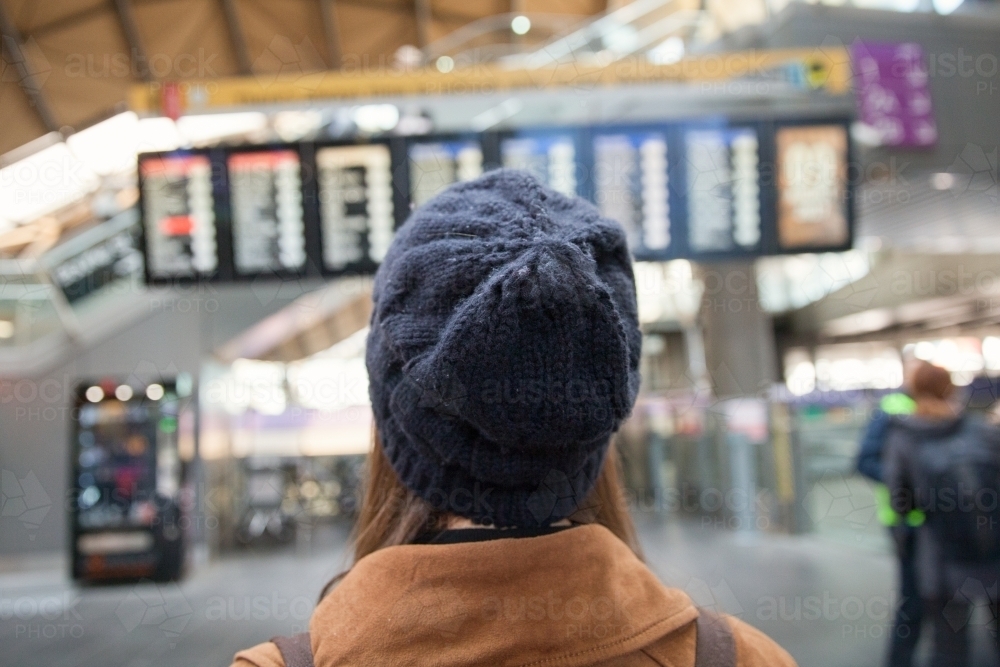 Checking the Train Timetable - Australian Stock Image