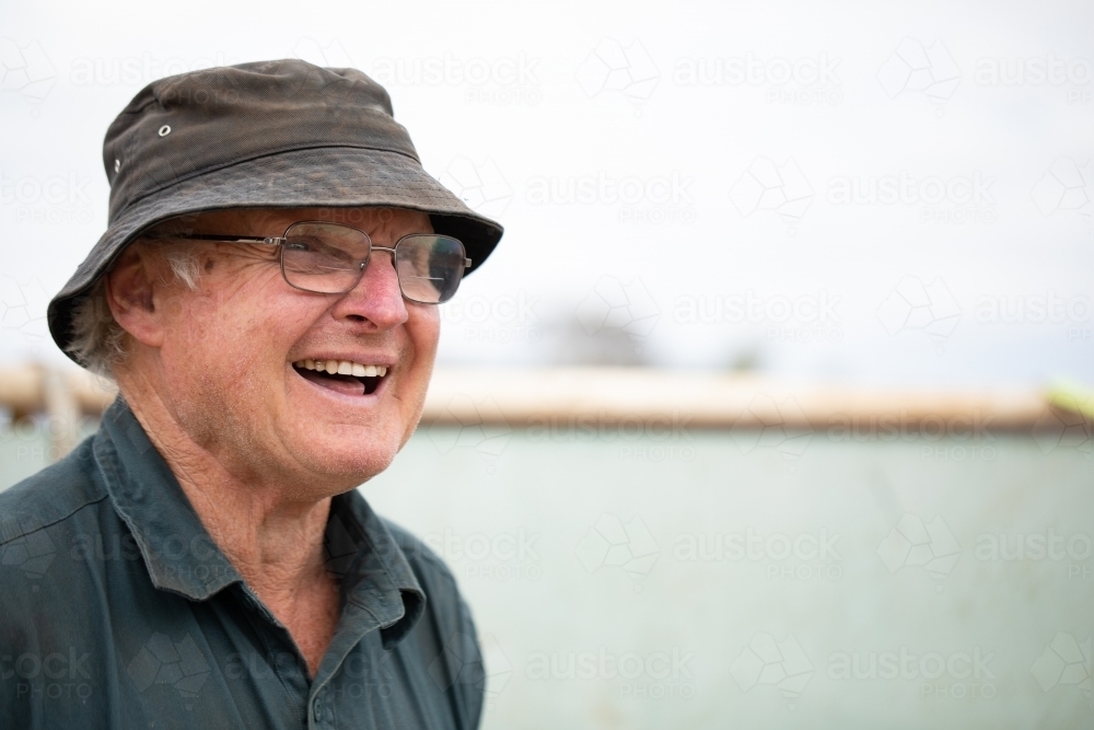 cheerful laughing self-employed manual worker - Australian Stock Image