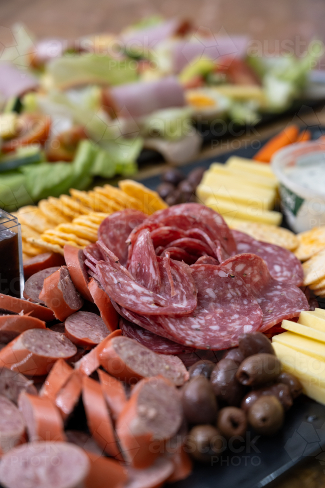 cheese and cold meet platter with vegetables - Australian Stock Image