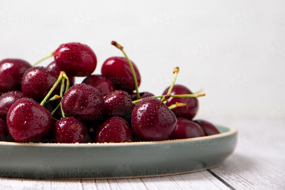 Cherries on a plate - Australian Stock Image