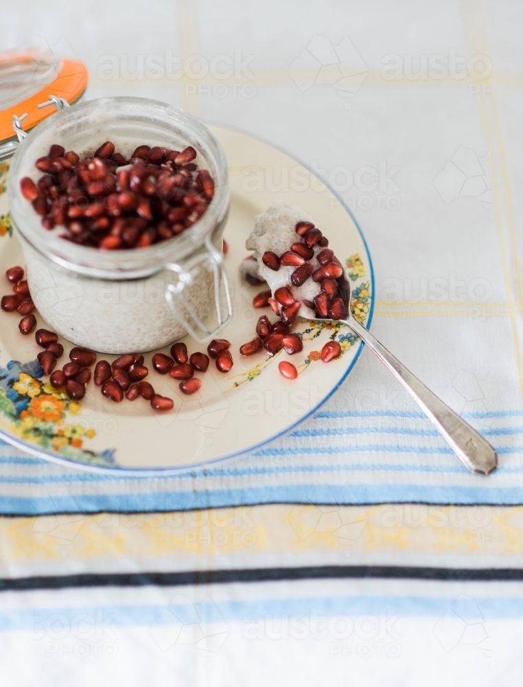Chia pudding with pomegranate - Australian Stock Image