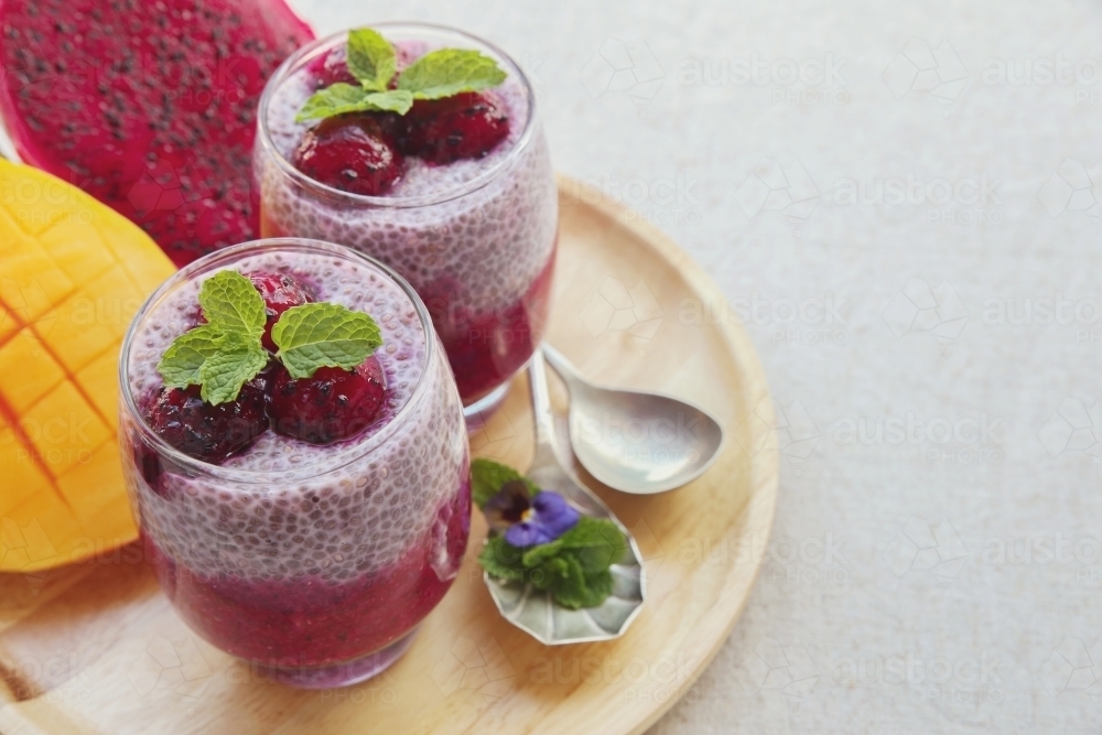 Chia seeds pudding with red dragon fruit and mango - Australian Stock Image
