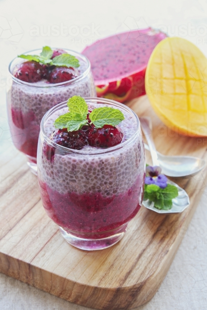 Chia seeds pudding with red dragon fruit and mango - Australian Stock Image